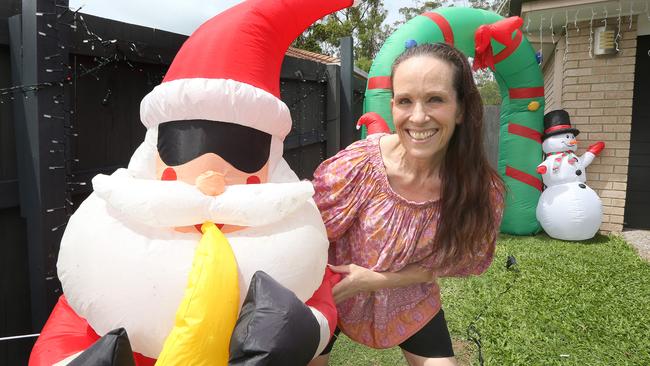 Ms  Brigit Daymond getting set for the Launch of the Christmas lights competition at her Nerang Home. Picture: Mike Batterham