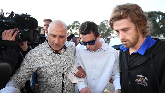 Salisbury West captain Adam Jones (centre) was handed a lifetime ban by the Adelaide Footy League after he was suspended for 27 weeks. Picture: Brad Fleet