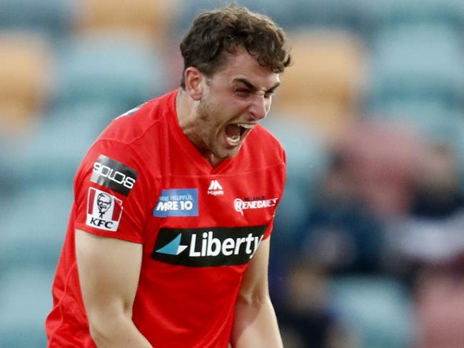 HOBART, AUSTRALIA - DECEMBER 12: Peter Hatzoglou of the Renegades celebrates the wicket of Cameron Bancroft of the Perth Scorchers during the Big Bash League match between the Melbourne Renegades and Perth Scorchers at Blundstone Arena, on December 12, 2020, in Hobart, Australia. (Photo by Darrian Traynor/Getty Images)