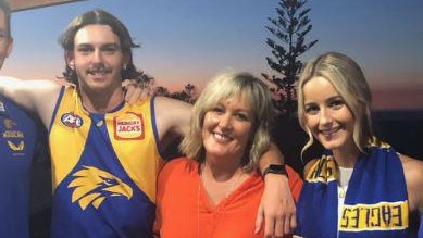 Kylie Bazzo (centre) with son Rhett (left) and daughter Kameron.