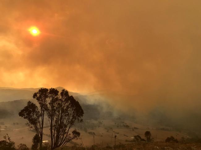 Looking over Naas Valley at the escalating Orroral Valley fire at Mount Tennent, NSW, Jan 31 2019. Picture: Kate Hudson