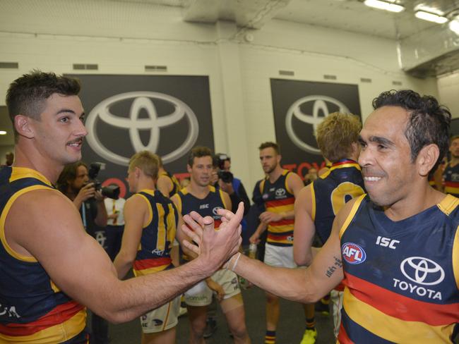 Crows’ Taylor Walker and Eddie Betts celebrate the team’s Showdown 42 win.