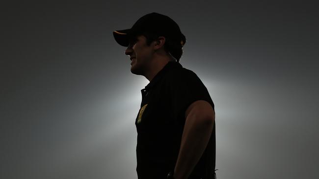 An umpire looks as smoke haze forces a stoppage to play during the Big Bash League match. Picture: Getty Images