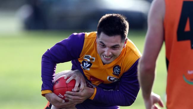 Jahd Anderson battles for the ball against Geelong West in April. Picture: David Smith