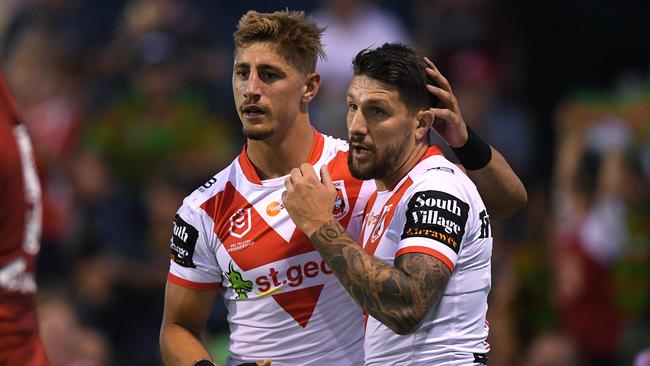 Zac Lomax celebrates with Gareth Widdop after scoring a try during the Charity Shield. Picture: AAP