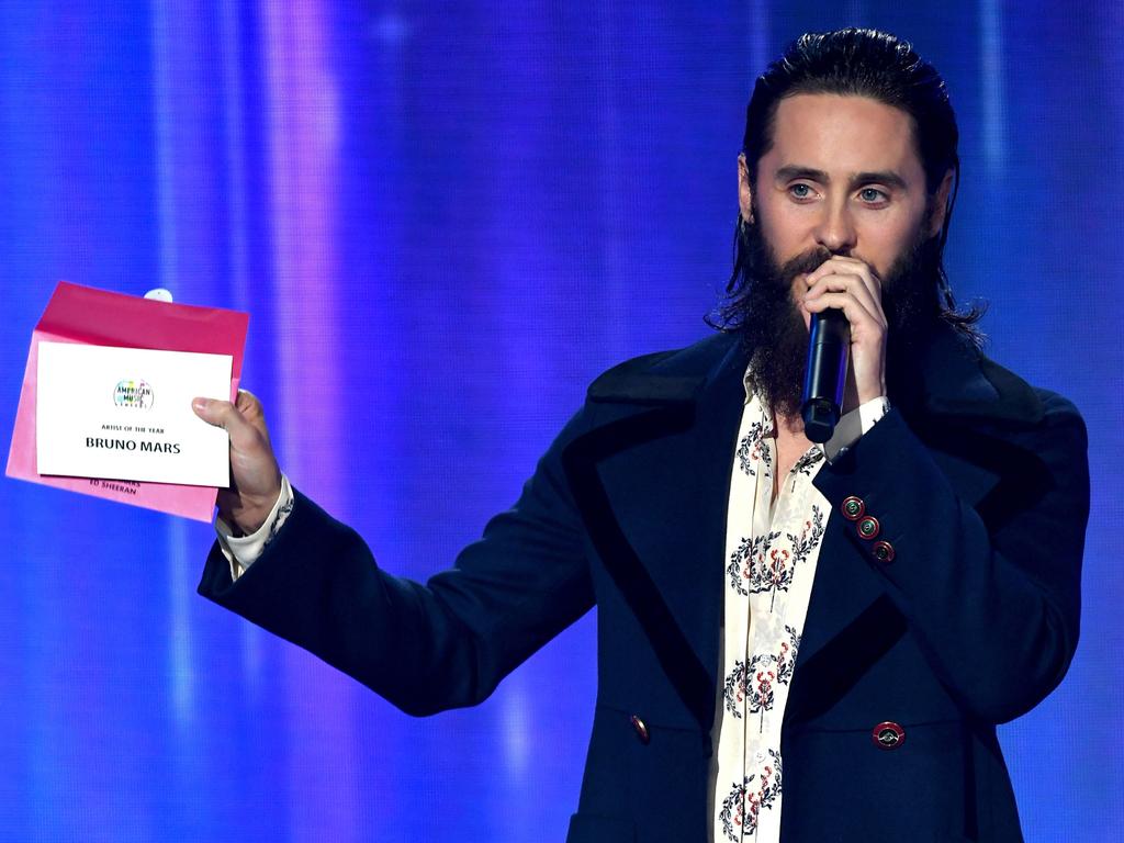 Jared Leto speaks while revealing a card announcing Bruno Mars as the winner of the Artist of the Year award onstage during the 2017 American Music Awards at Microsoft Theater on November 19, 2017 in Los Angeles, California. Picture: AFP