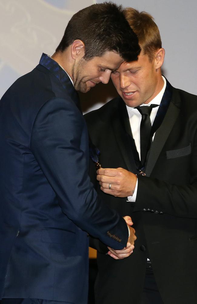 Sam Mitchell and Trent Cotchins congratulate each other after receiving their Brownlow Medals. Picture: Michael Klein