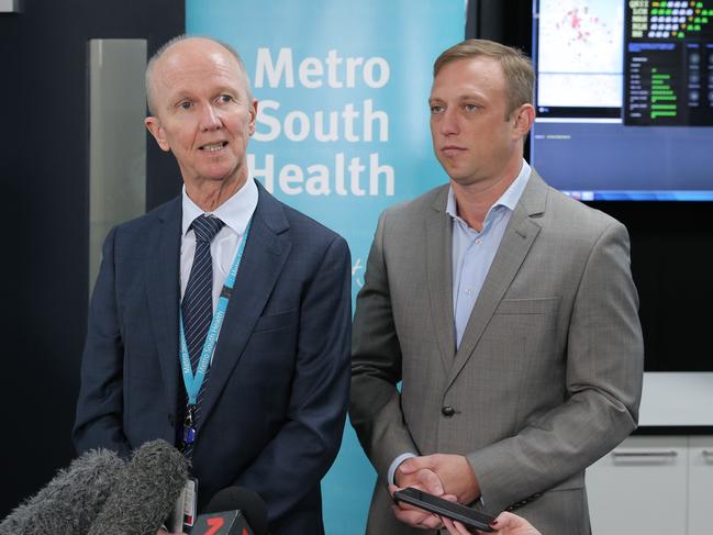 Stephen Ayre (left) with Health Minister Steven Miles