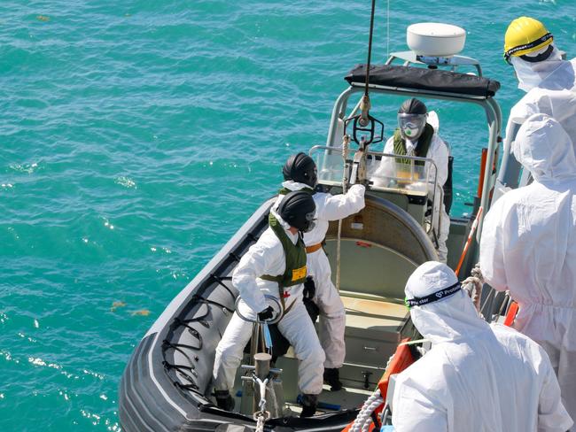 Royal Australian Navy sailors from HMAS Brisbane prepare to board a Rigid-Hulled Inflatable Boat to conduct search and rescue operations in the vicinity of Lindeman Island, Queensland, 29 July 2023. A multi-national and multi-agency search and rescue effort is underway following an Australian Army MRH-90 Taipan helicopter impacting waters near Lindeman Island on the night of 28 July 2023 during Exercise Talisman Sabre 23. *** Local Caption *** Exercise Talisman Sabre 2023 is being conducted across northern Australia from 22 July to 4 August.    More than 30,000 military personnel from 13 nations will directly participate in Talisman Sabre 2023, primarily in Queensland but also in Western Australia, the Northern Territory and New South Wales.     Talisman Sabre is the largest Australia-US bilaterally planned, multilaterally conducted exercise and a key opportunity to work with likeminded partners from across the region and around the world.    Fiji, France, Indonesia, Japan, Republic of Korea, New Zealand, Papua New Guinea, Tonga, the United Kingdom, Canada and Germany are all participating in Talisman Sabre 2023 with the Philippines, Singapore and Thailand attending as observers.    Occurring every two years, Talisman Sabre reflects the closeness of our alliance and strength of our enduring military relationship with the United States and also our commitment to working with likeminded partners in the region.    Now in its tenth iteration, Talisman Sabre provides an opportunity to exercise our combined capabilities to conduct high-end, multi-domain warfare, to build and affirm our military-to-military ties and interoperability, and strengthen our strategic partnerships. Picture: NCA NewsWire / Australian Defence Imagery