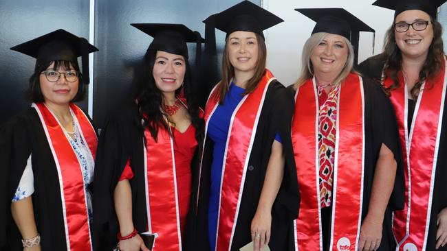 Nurul Williams, Nerissa Muscat, Satsuko Smith, Susan Jacobs and Kate Duffin at the 2023 TAFE Queensland Bundaberg graduation ceremony.