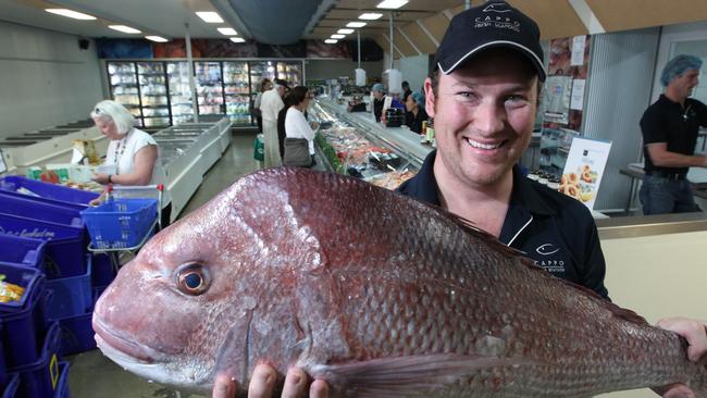 Cappo Seafood general manager Damian Cappo with some local snapper fish produce at his Parkside store.