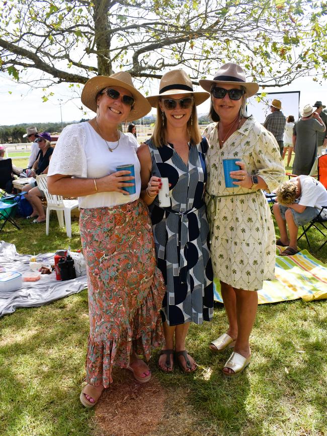 Krishna Thurston, Carolyn Wood and Adrienne Elliott having an action-packed day at the Ladbrokes Stony Creek Cup on Sunday, March 09, 2025. Picture: Jack Colantuono