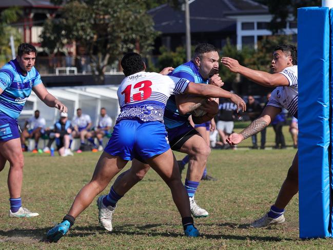 An unstoppable George Lolo on his way to scoring close to the posts. Picture: Adam Wrightson Photography