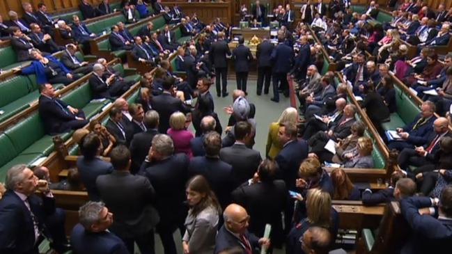 Tellers in the House of Commons prepare to give the result of the vote. Picture: AFP.