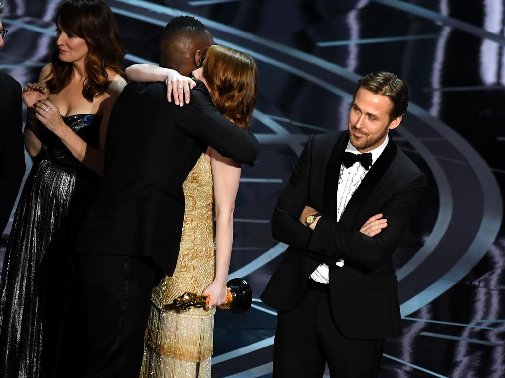 ‘Moonlight’ actor Mahershala Ali hugs Emma Stone after it was discovered ‘La La Land’ was mistakenly announced as Best Picture onstage during the 89th Annual Academy Awards. Picture: AFP