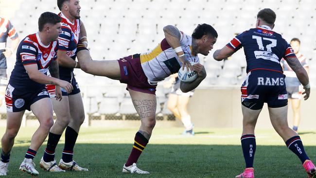 Thirlmere's Jacob Loko looks for support. Picture: John Appleyard