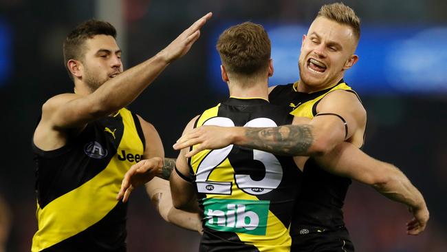 Richmond players celebrate during the Tigers’ win against Sydney.