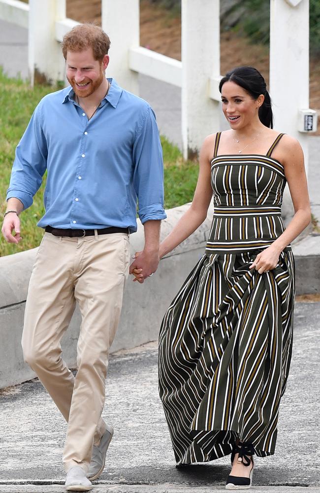 She ditched her preference for navy with eye-catching stripes at Bondi yesterday … and is cost about $1600.Picture: AAP