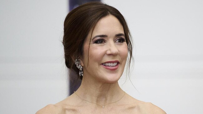 Crown Princess Mary of Denmark wears a simple necklace bearing her husband’s initial. Picture: Carlos Alvarez/Getty Images