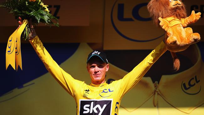 RODEZ, FRANCE - JULY 17: Chris Froome of Great Britain and Team Sky celebrates after retaining the overall leader's yellow jersey after stage thirteen of the 2015 Tour de France, a 198.5 km stage between Muret and Rodez, on July 17, 2015 in Rodez, France. (Photo by Bryn Lennon/Getty Images)