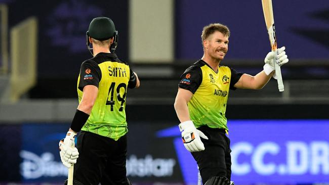 David Warner celebrates his half-century. Picture: AFP