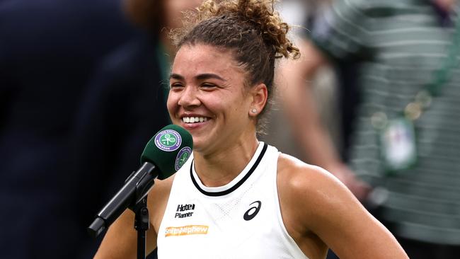 Jasmine Paolini of Italy was all smiles at the microphone. Photo by Francois Nel/Getty Images.