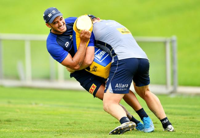 Valentine Holmes belted by Michael Morgan at Cowboys training. Picture: Alix Sweeney