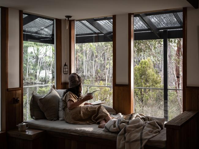 The Voyager’s inviting daybed is perfect for reading a book on while taking in the dreamy view. Picture: Lean Timms