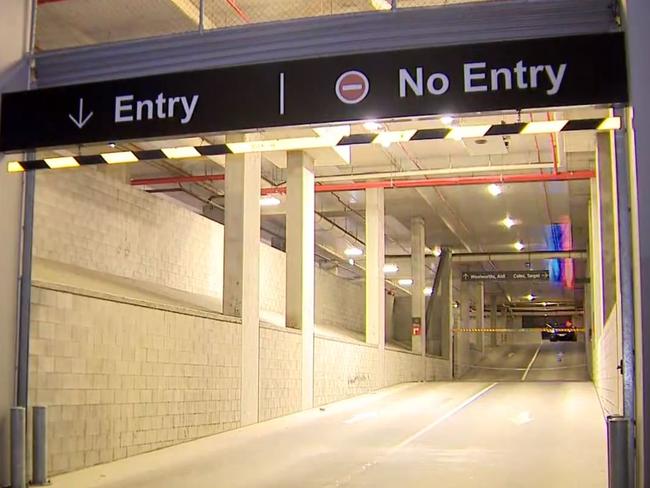 A police car inside the car park Saturday night. Picture: 9 News Qld