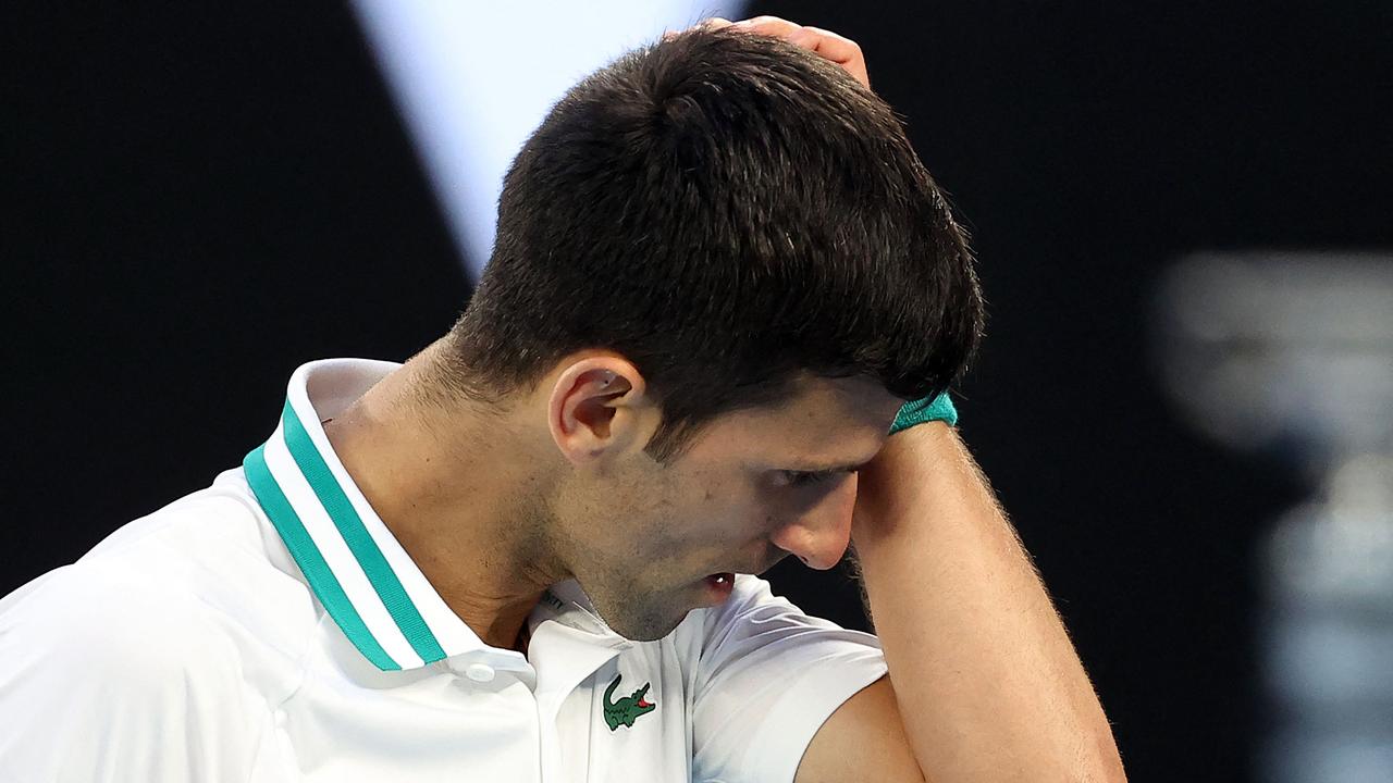 Novak Djokovic overcame a controversial few weeks off the court to succeed on it. (Photo by David Gray / AFP)