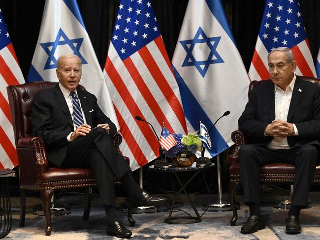 Joe Biden listens to Israel's Prime Minister Benjamin Netanyahu as he joins a meeting of the Israeli war cabinet in Tel Aviv. Picture: AFP.