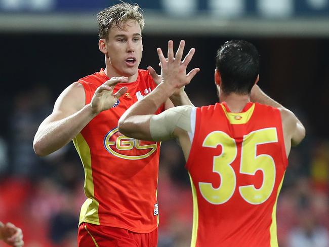 GOLD COAST, AUSTRALIA - JULY 15:  Tom Lynch of the Suns celebrates a goal during the round 17 AFL match between the Gold Coast Suns and the Collingwood Magpies at Metricon Stadium on July 15, 2017 in Gold Coast, Australia.  (Photo by Chris Hyde/Getty Images)