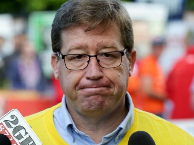 Glum-faced Troy Grant can’t hide his disappointment at the disastrous Orange by-election result.