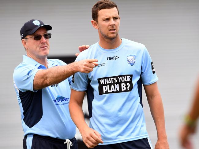 Geoff Lawson, left, has slammed Justin Langer’s selection policies