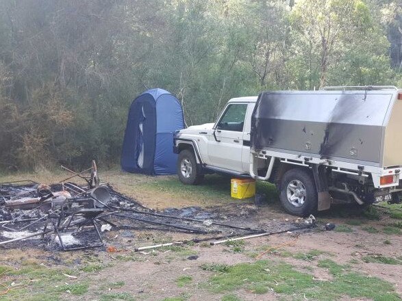 Russell Hill and Carol Clay's burnout campsite photographed by a camper near Dry River track at Billabong in the Wonnangatta Valley. Pic credit: ABC