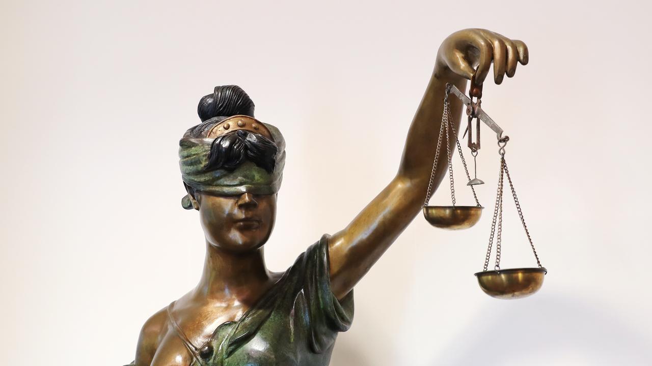 Lady Justice and the scales of justice. Picture: Brendan Radke