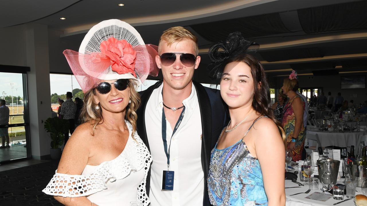 Jodi Linnett, Ryan Blenkinship and Elky Linnett enjoy the 2020 Great Northern Darwin Cup Carnival punters at new grand stand. Picture: Katrina Bridgeford