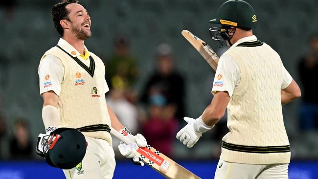 Travis Head celebrates scoring his century with teammate Marnus Labuschagne. Picture: AFP