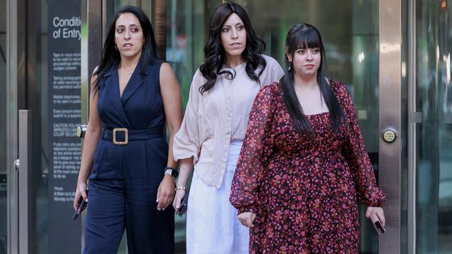 =Sisters Elly Sapper, Nicole Meyer and Dassi Erlich leave the Victorian County Court after a mixed verdict in the sexual abuse trial of accused former Melbourne school principal Malka Leifer. Picture: NCA NewsWire / David Geraghty