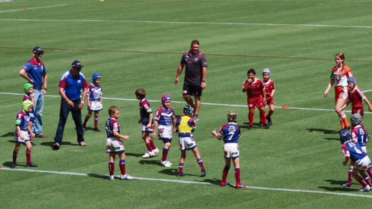 The Roma Saints Juniors on the field playing against the Redcliffe team at Suncorp Stadium as part of the Dolphins NRL Mini League. Picture: Dolphins Rugby League.