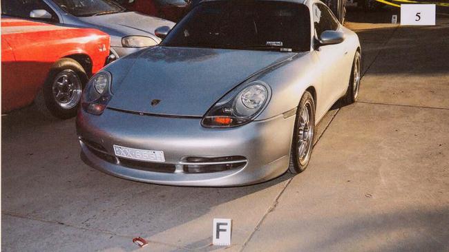 A silver Porsche outside the warehouse. Picture released by Supreme Court.