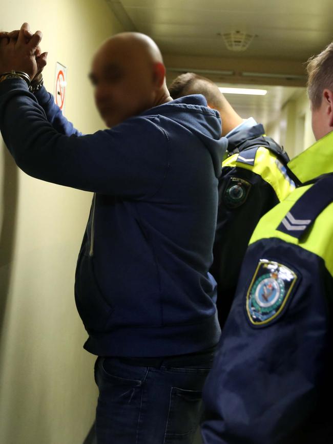 A man arrested during the operation.