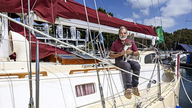SYDNEY, AUSTRALIA, NOVEMBER 22, 2023. Sylph VI skipper and owner Robert â€˜Bobâ€™ Williams with his cat Oli who will sail with Bob in the Sydney to Hobart yacht race on board Sylph VI. Photographer: Adam Yip