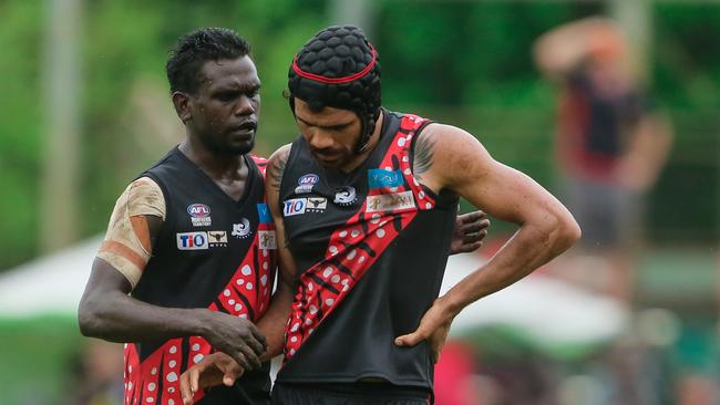 Cyril Rioli and Adam Tipungwuti in action for the Tiwi Bombers.