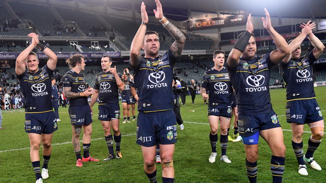 Cowboys' players celebrate their win in the NRL elimination final.