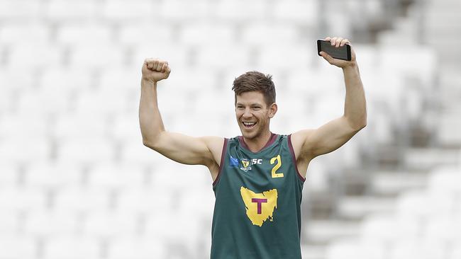 Tim Paine played football in secret early in his career.