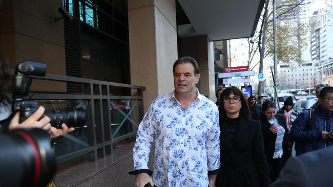 John Setka arrives at the Melbourne Magistrate court with his wife Emma Walters for an earlier hearing. Picture: David Crosling