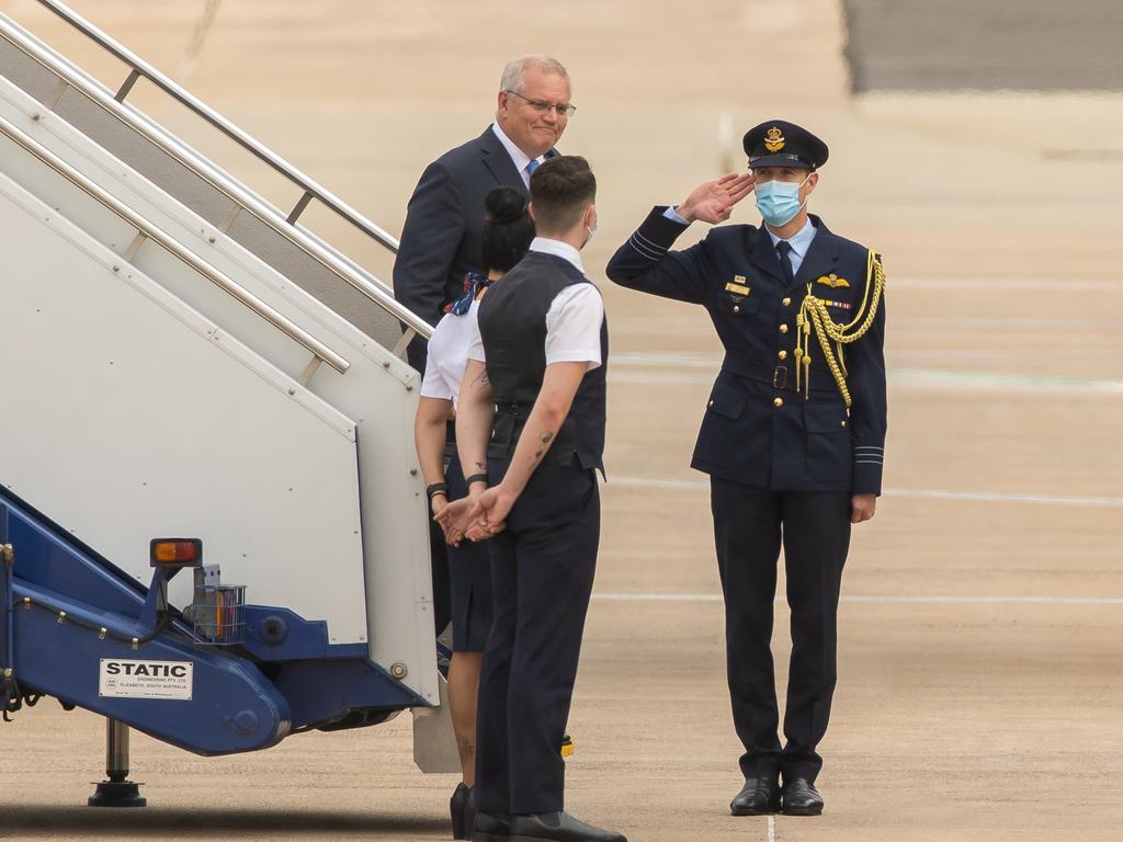 The Prime Minister pictured arriving in Canberra aboard a defence plane ahead of the announcement of the federal election. Picture: Jason Edwards