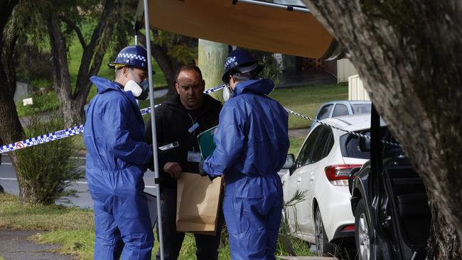 Forensic police at Freeman at Lalor Park, where three children died in an alleged domestic violence-related house fire. Picture: Richard Dobson