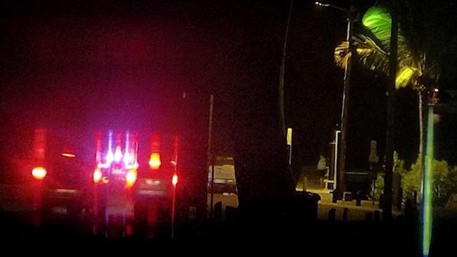 Police officers swarm on the men as they arrive at a boat ramp at Boyne Island. Picture: AFP